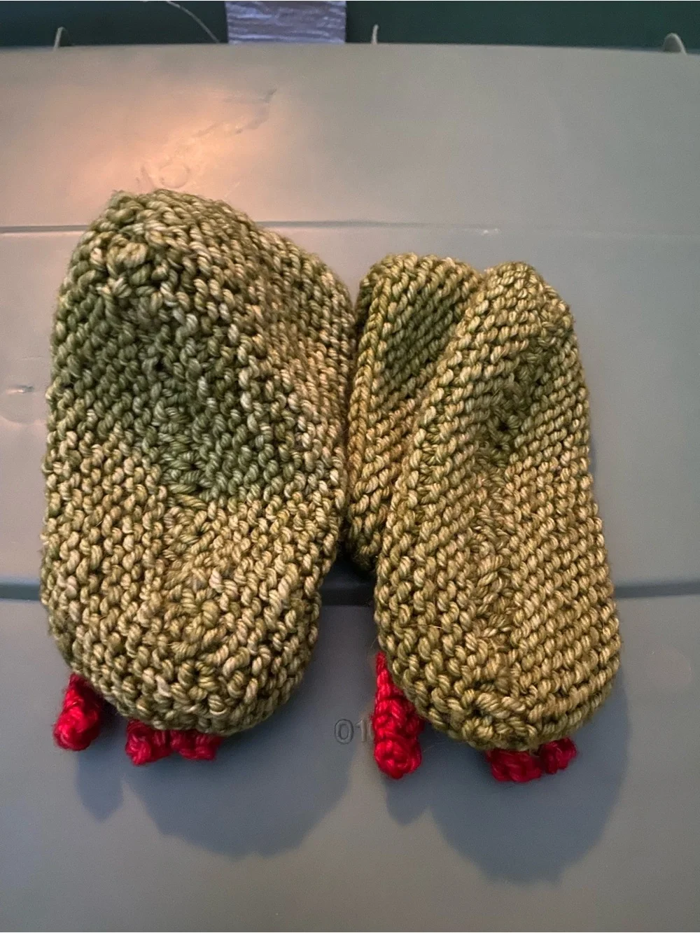 Hand-Knit Green Baby Booties with Red Claw Details